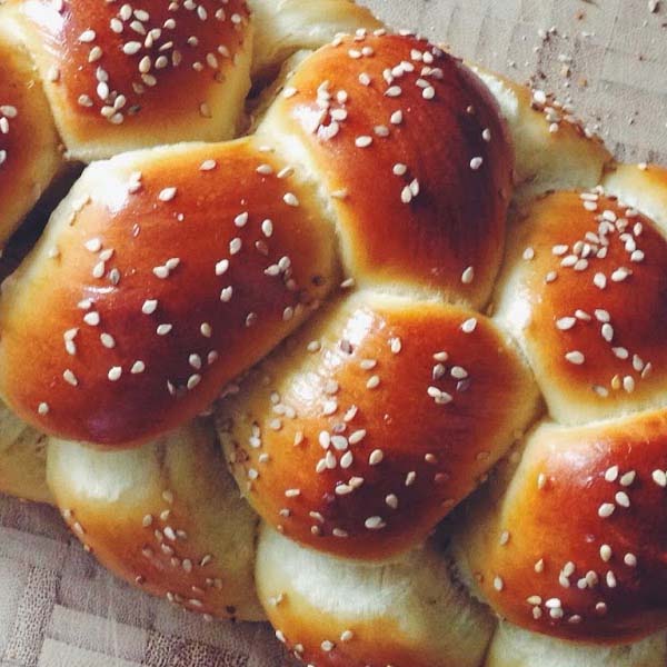 Detailed view of challah bread with sesame seeds